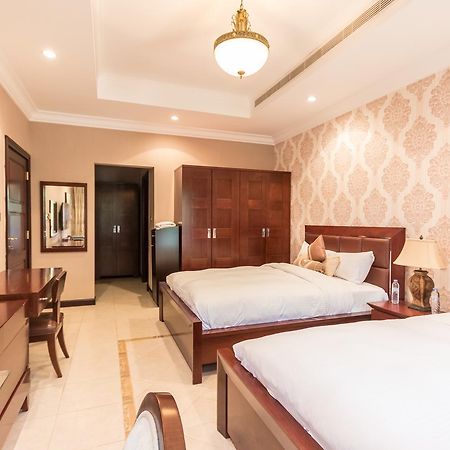 Yanjoon Holiday Homes - Palm Jumeirah Frond A Villas Dubai Buitenkant foto