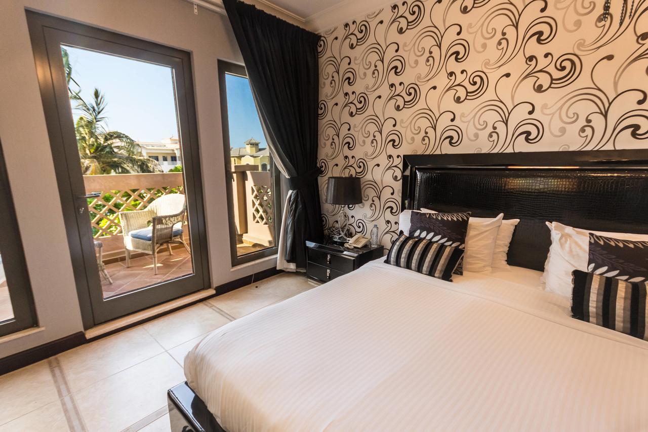 Yanjoon Holiday Homes - Palm Jumeirah Frond A Villas Dubai Buitenkant foto